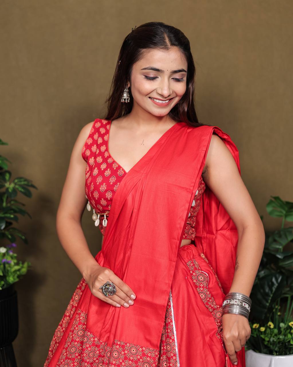 Beautiful Ajarakh Printed Kali with Fully Flaird Red lahengha Choli
